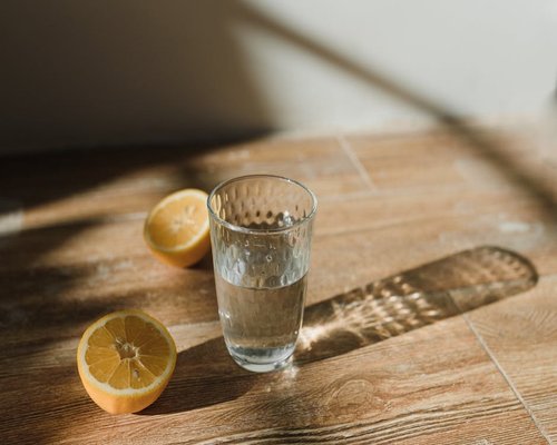 Glass of water with lemon slices