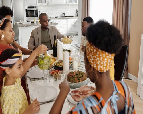 Family sharing a meal together at home